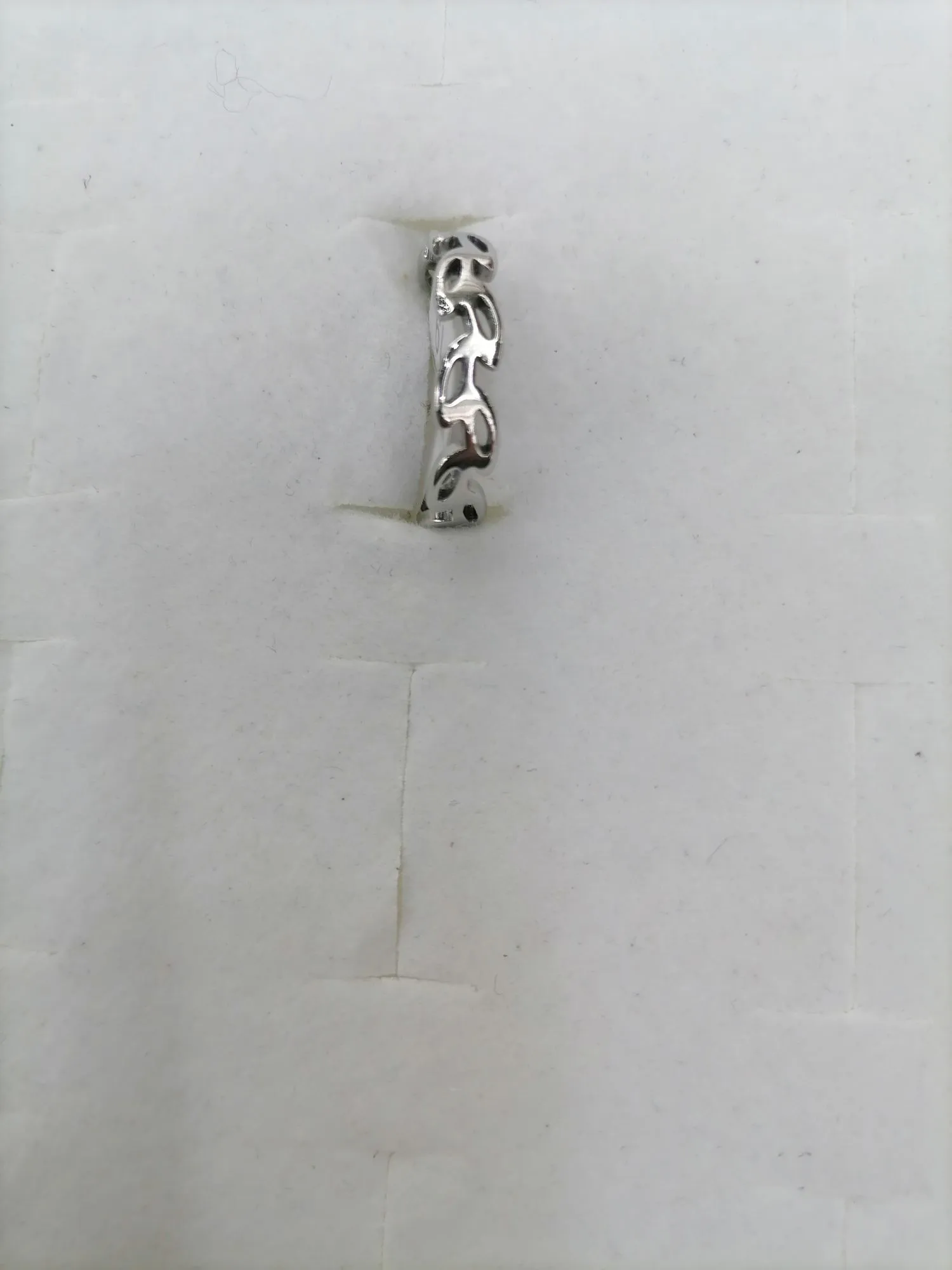 Titanium steel silver perforated leaf-shaped layout design detail image 2