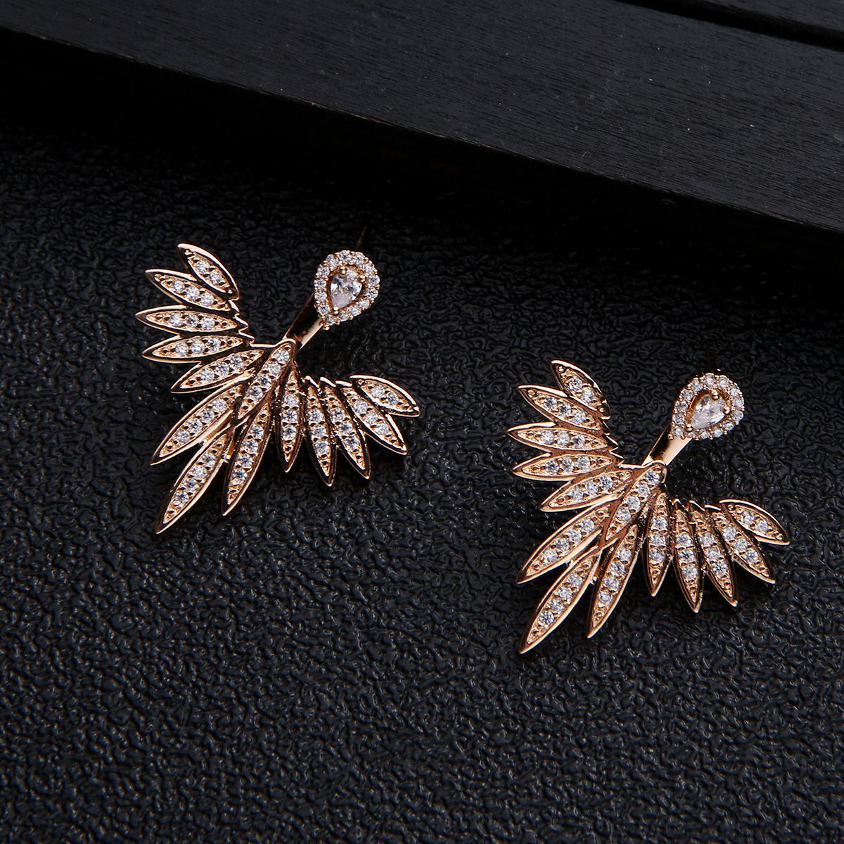S925 Silver needle European-style copper inlaid zircon geometric feather simple women's short stud earrings, double women's stud earrings detail image 3