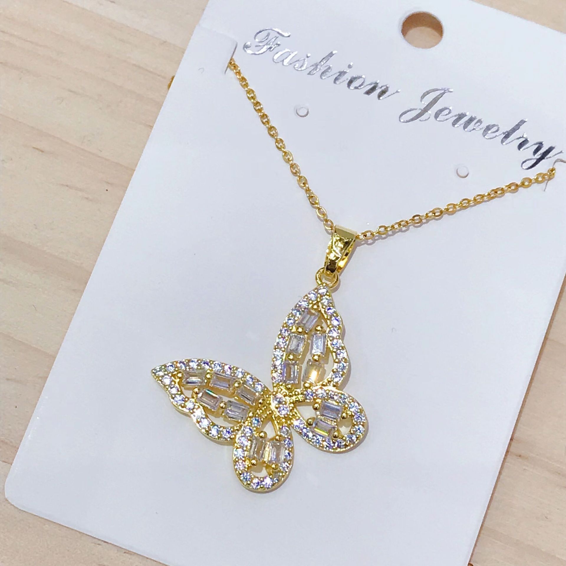 European and American cross-border supply, niche and unique hip-hop fashion accessories, design sense, colorful zircon butterfly necklace pendant for women Item Picture