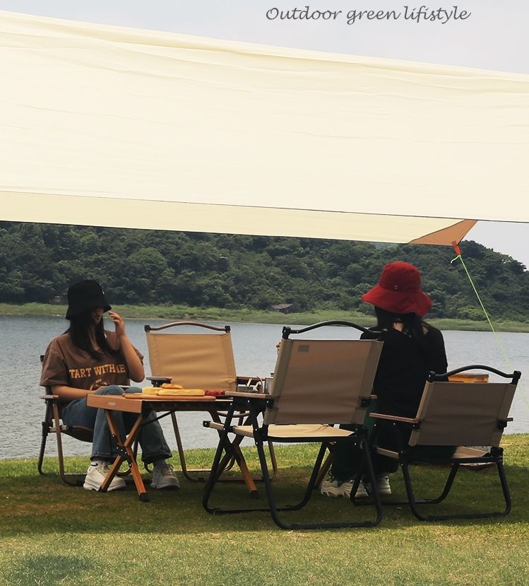 Star Outdoor Table and Chair Folding portable one table and four chairs, courtyard camping aluminum alloy leisure egg roll table, camping table, outdoor portable camping picnic bamboo table, lightweight cake table, complete set vehicle, folding coffee table and dining table for dual use Application Scenario