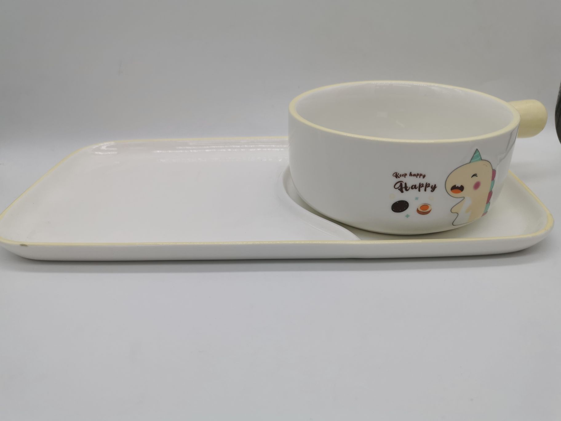 黄色卡通恐龙陶瓷面把碗连盘