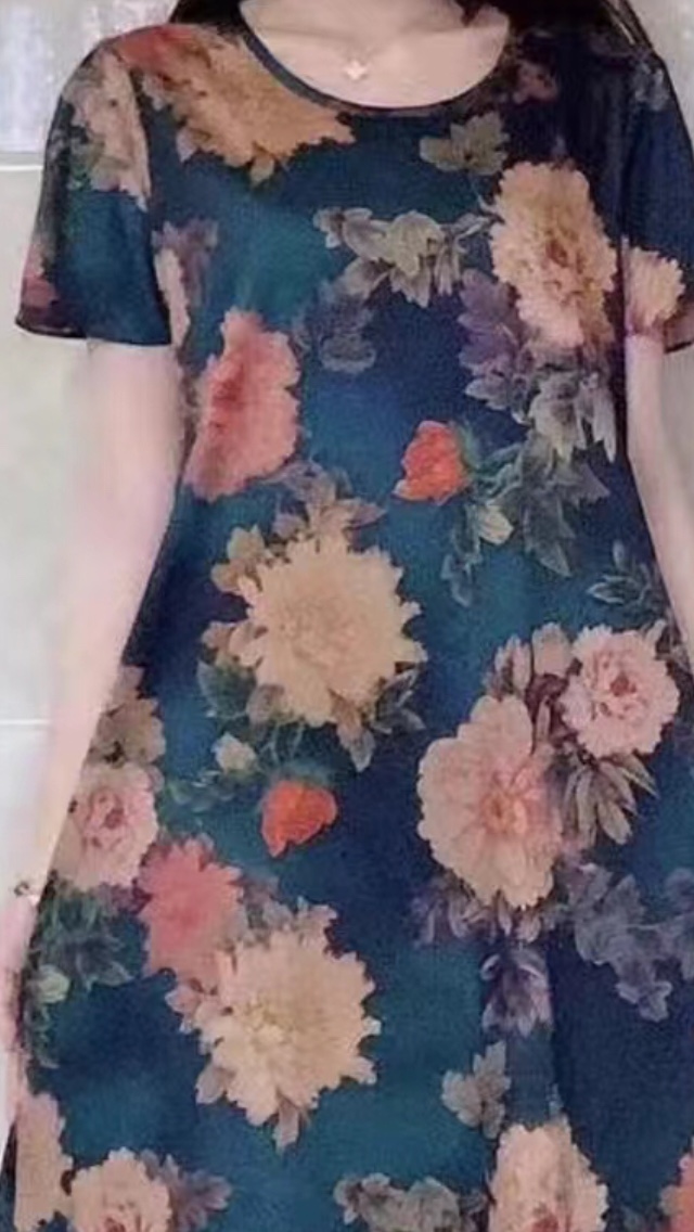 A silk-like dress with large floral patterns in blue and green Specification image