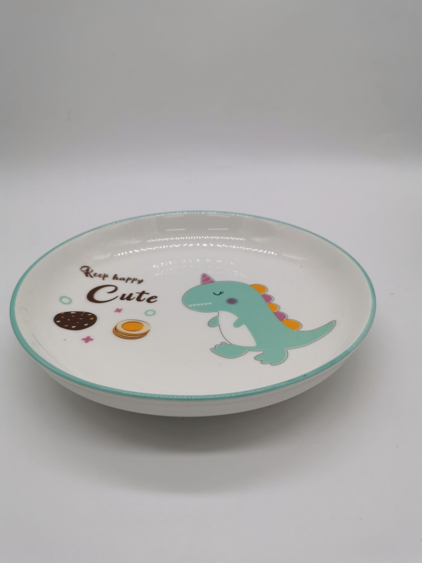 绿色卡通恐龙陶瓷圆盘