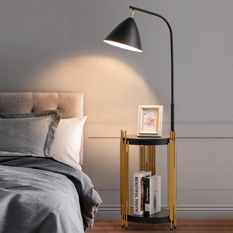 A golden and black table with a ground lamp Application Scenario