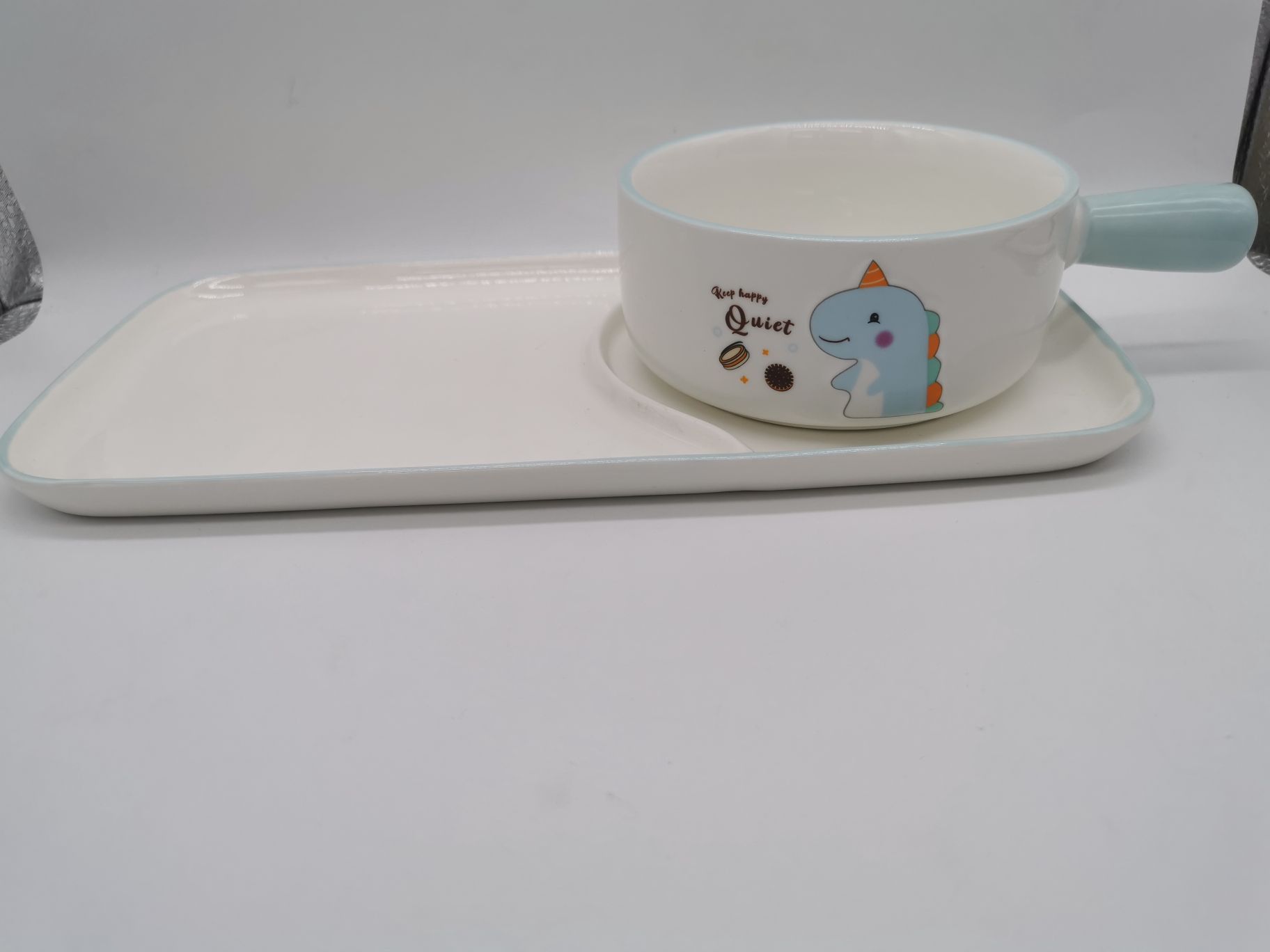 蓝色卡通恐龙陶瓷面把碗连盘