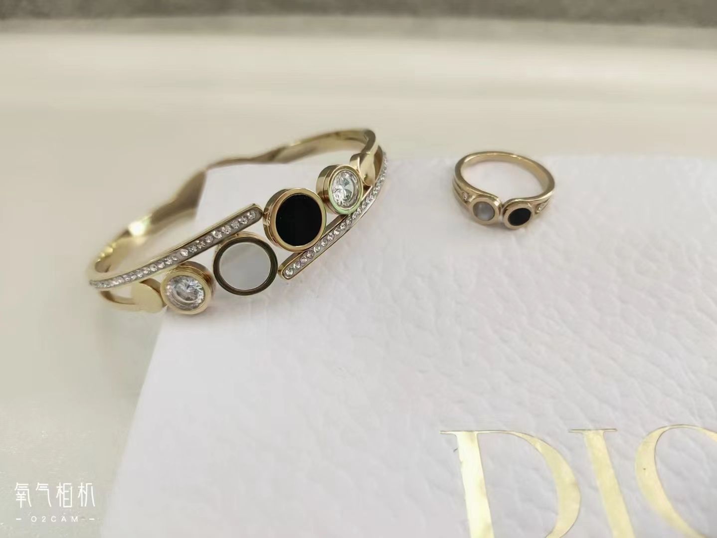 The bracelet exudes a light luxury and high-end vibe. It is made of titanium steel, a niche product that does not fade, and features an exquisite, ins fashion design. The golden bracelet ring set is simple and elegant for girls