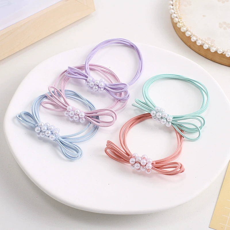 Korean pearl bow hair band, simple and elegant, high-elasticity and durable rubber band, fresh and clean hair tie wholesale detail image 5