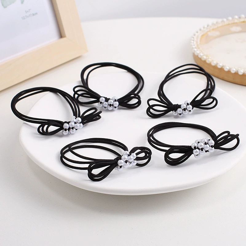 Korean pearl bow hair band, simple and elegant, high-elasticity and durable rubber band, fresh and clean hair tie wholesale Application Scenario