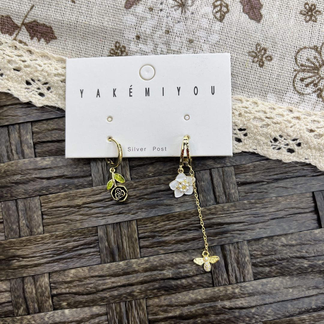 新款气质时尚潮流精致小巧型滴油黑白色花朵