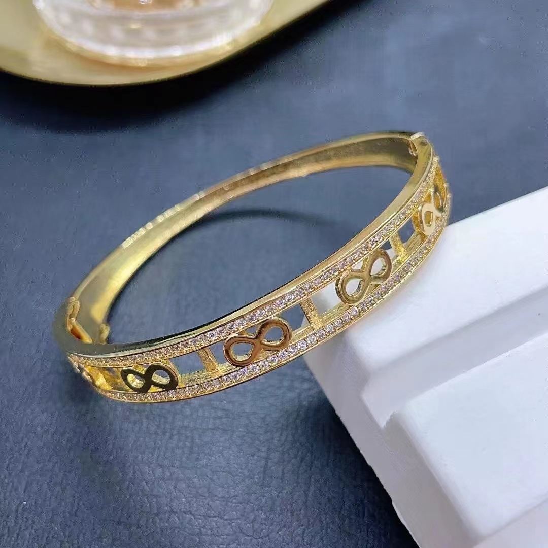 New popular accessories from Europe and America: Women's copper micro-inlaid zircon hollowed-out design bracelet, colorful zircon heart bracelet detail image 4