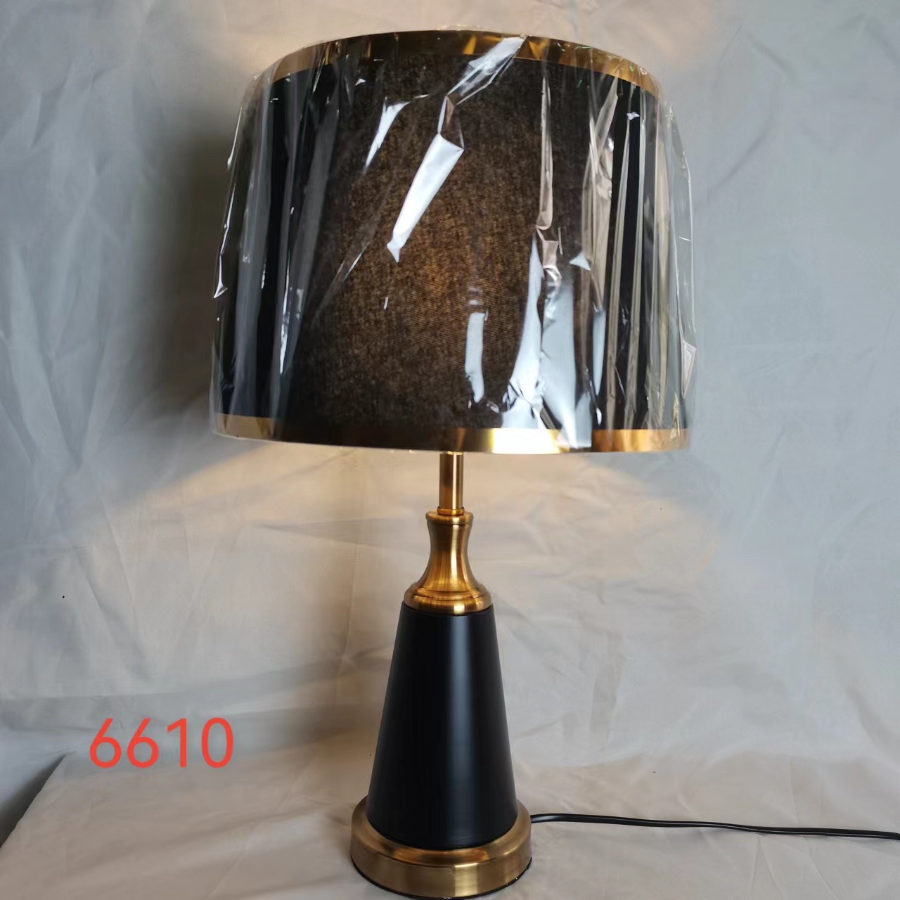 A retro black ironwork table lamp