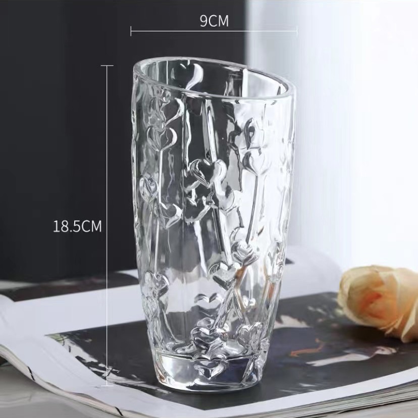 Crystal glass vase with a slanted mouth and a large belly details Picture