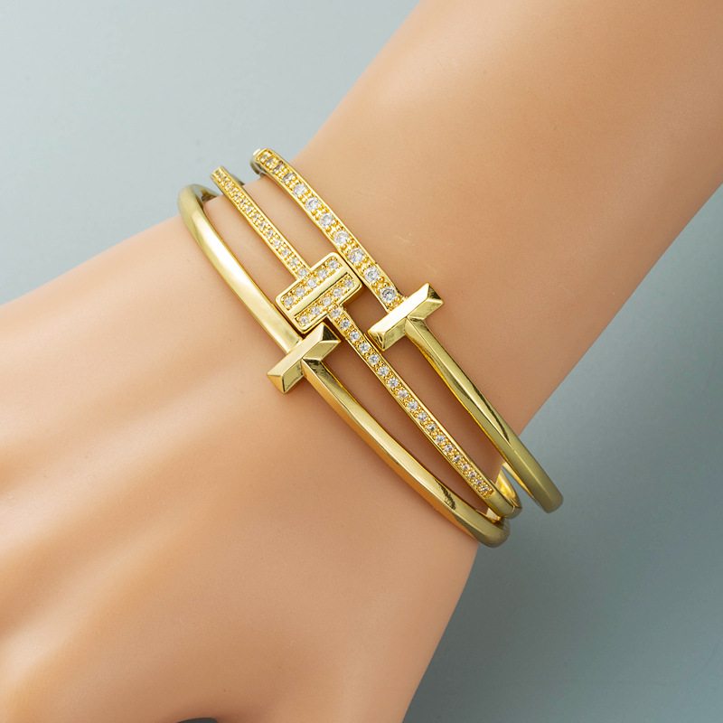 European and American cross-border simple and individual geometric T-shaped buckle bracelet, women's copper plated with 18K real gold color retention, slightly inlaid zircon bracelet