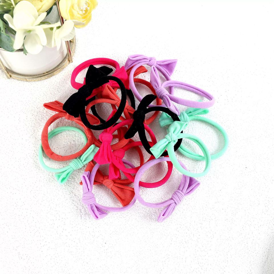 The new Korean version of the high-elasticity bow towel ring is a bestseller on Douyin. It's a fresh and simple hair tie that won't damage your hair detail image 4