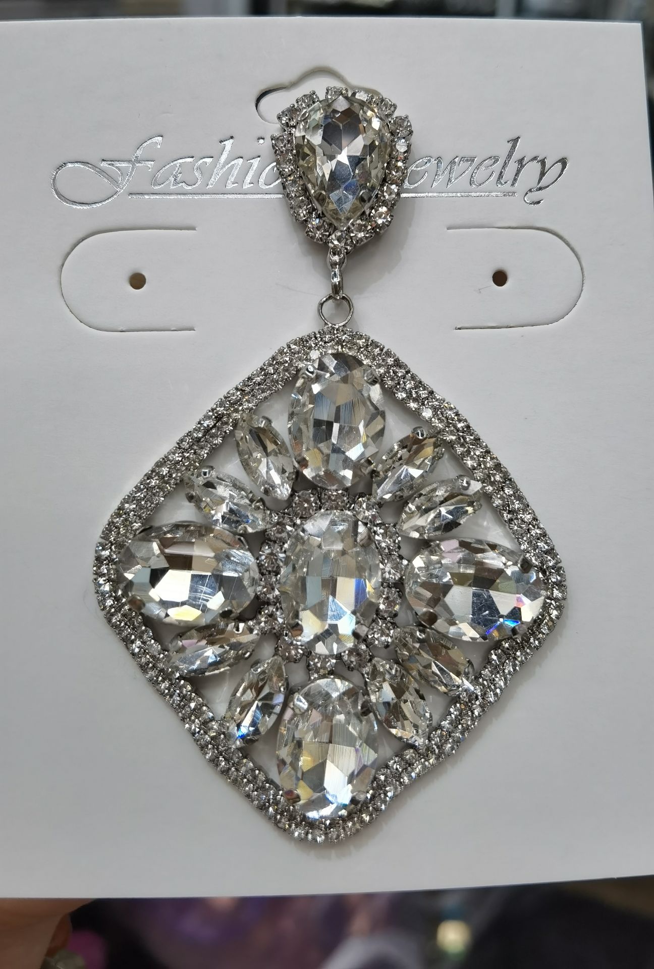European and American fashion hollowed-out oval diamond chain earrings, long style, elegant and individual teardrop stud earrings, Chao Xia 18