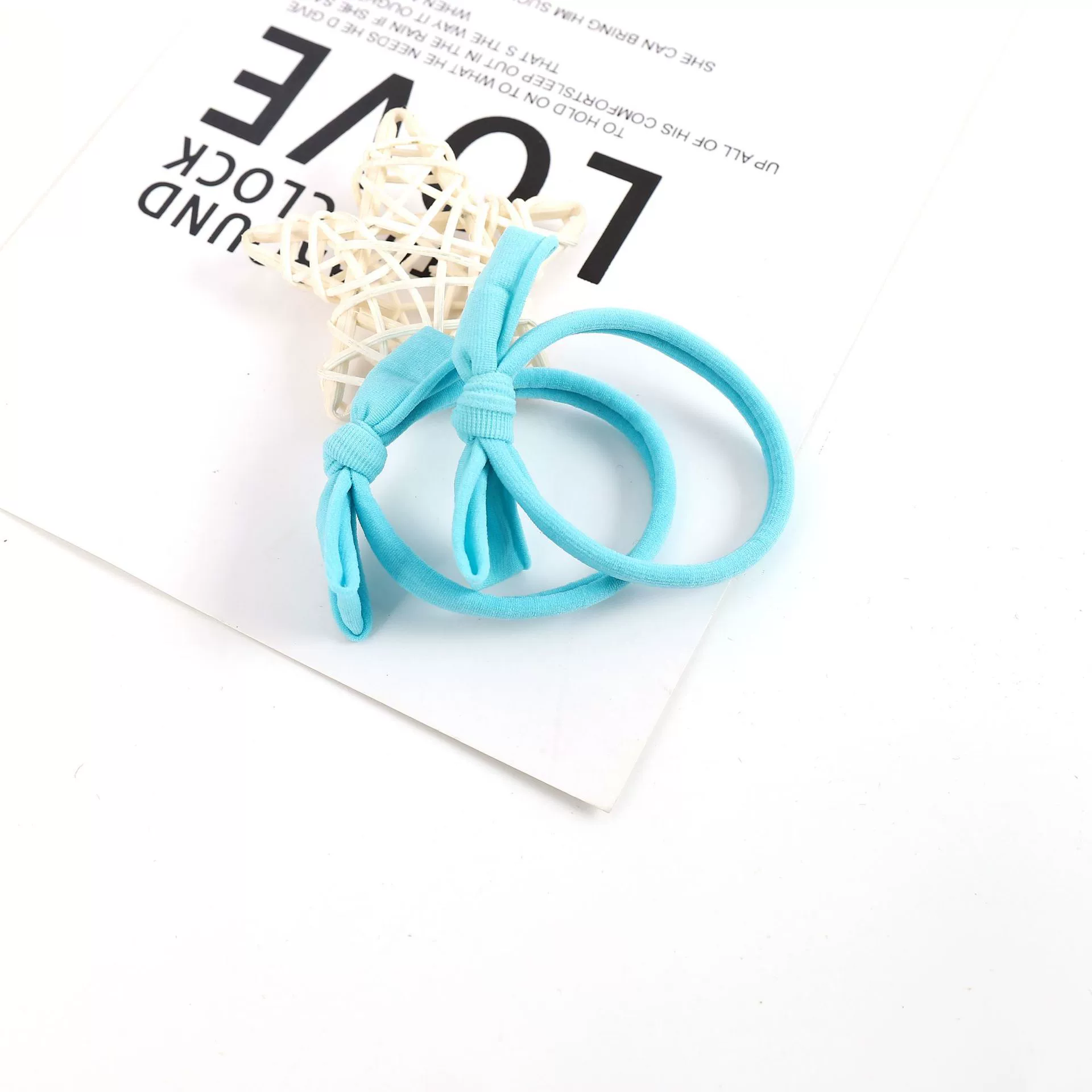 The new Korean version of the high-elasticity bow towel ring is a bestseller on Douyin. It's a fresh and simple hair tie that won't damage your hair detail image 10