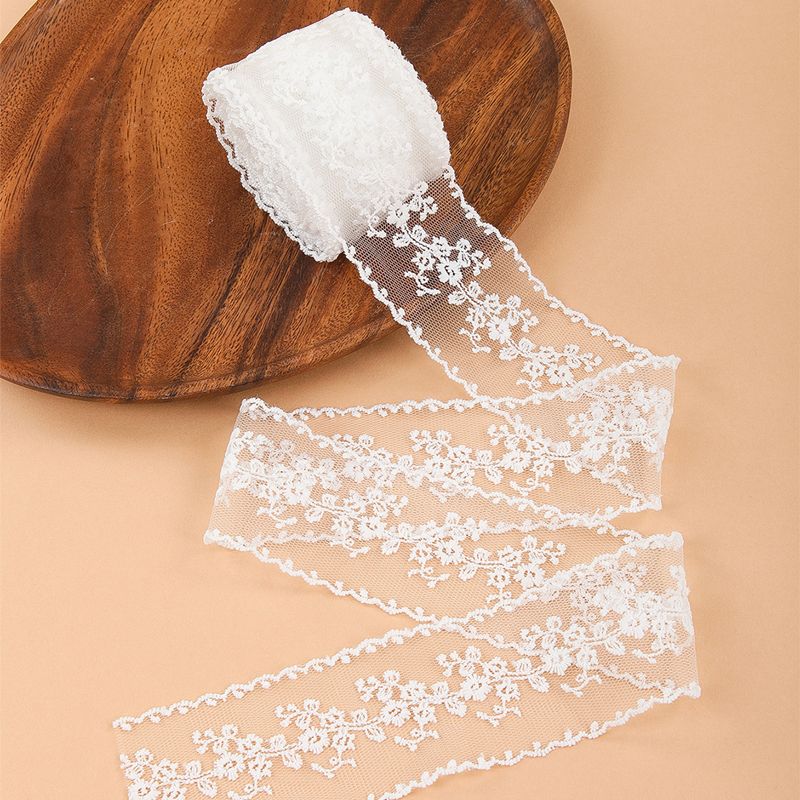 The white mesh lace is in stock for 5 sizes and available for sale. The width is 5cm