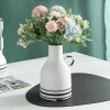 A modern Nordic style aged handle ceramic vase details Picture