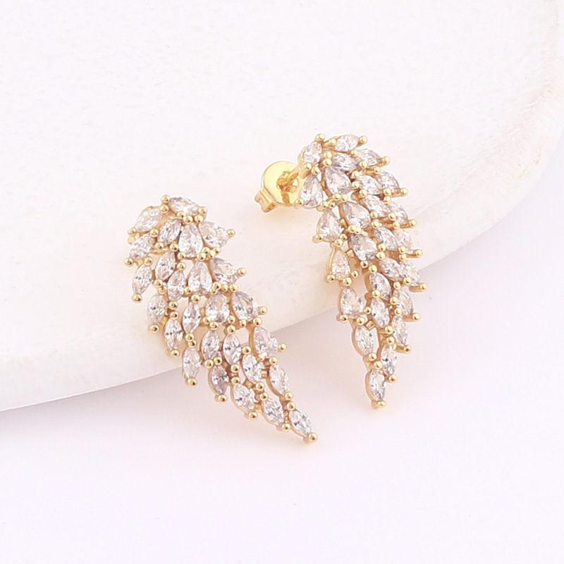 European and American cross-border creative copper gold-plated colored zircon inlaid symmetrical angel wing-shaped ear studs detail image 5