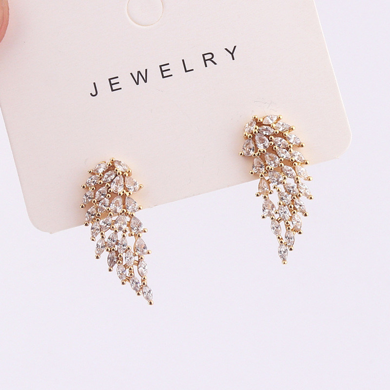 European and American cross-border creative copper gold-plated colored zircon inlaid symmetrical angel wing-shaped ear studs detail image 6