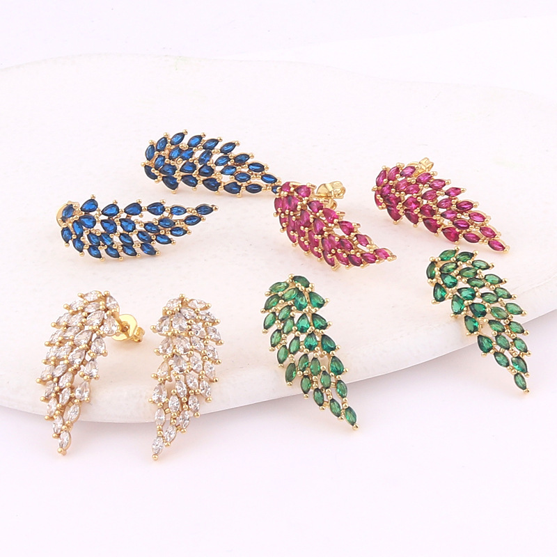 European and American cross-border creative copper gold-plated colored zircon inlaid symmetrical angel wing-shaped ear studs detail image 2