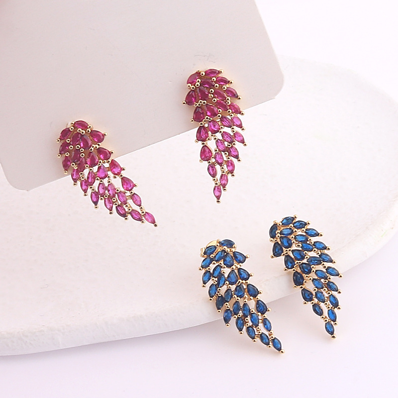 European and American cross-border creative copper gold-plated colored zircon inlaid symmetrical angel wing-shaped ear studs Specification image