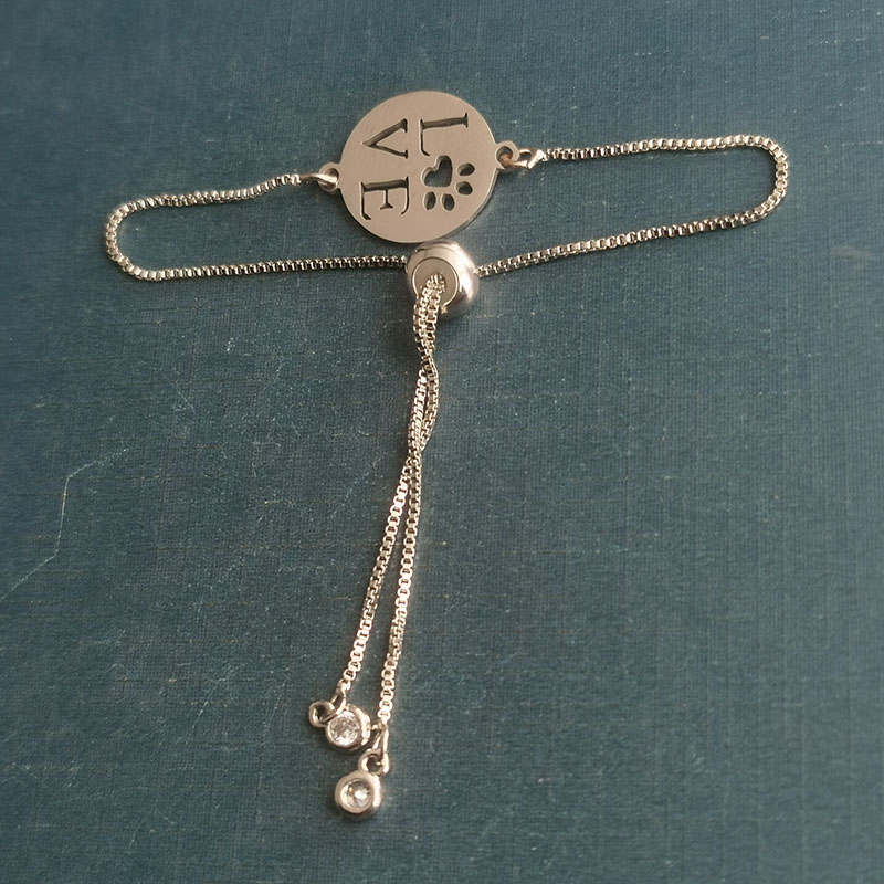 Titanium steel animal dog paw pendants, cross-border best-selling stainless steel love jewelry accessories wholesale in Europe and America Specification image