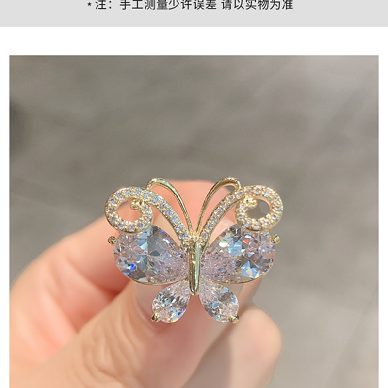 The "Butterfly Emerging from Cocoon" crystal brooch, a niche design with anti-glare clasp and butterfly collar needle, is a fixed accessory for women's coats detail image 3