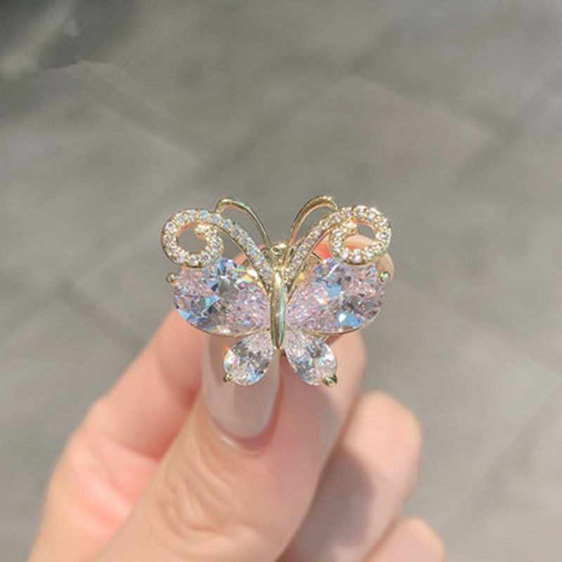 The "Butterfly Emerging from Cocoon" crystal brooch, a niche design with anti-glare clasp and butterfly collar needle, is a fixed accessory for women's coats detail image 2