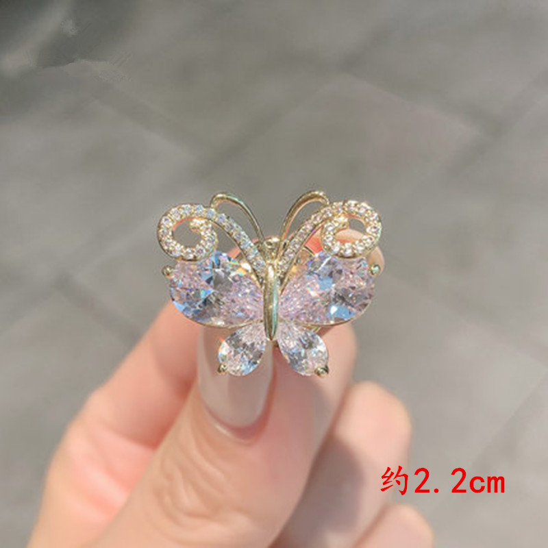 The "Butterfly Emerging from Cocoon" crystal brooch, a niche design with anti-glare clasp and butterfly collar needle, is a fixed accessory for women's coats detail image 5