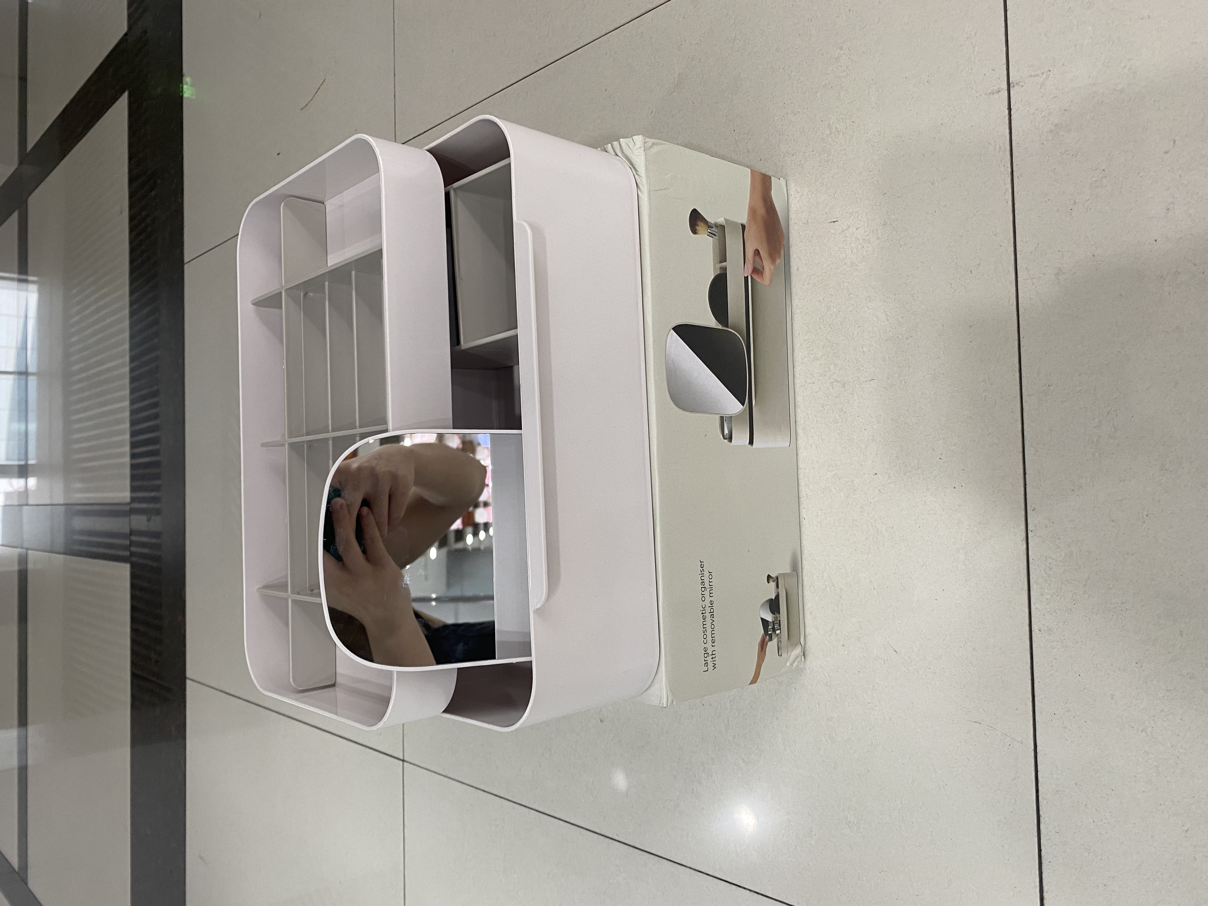 Cosmetics storage box with mirror