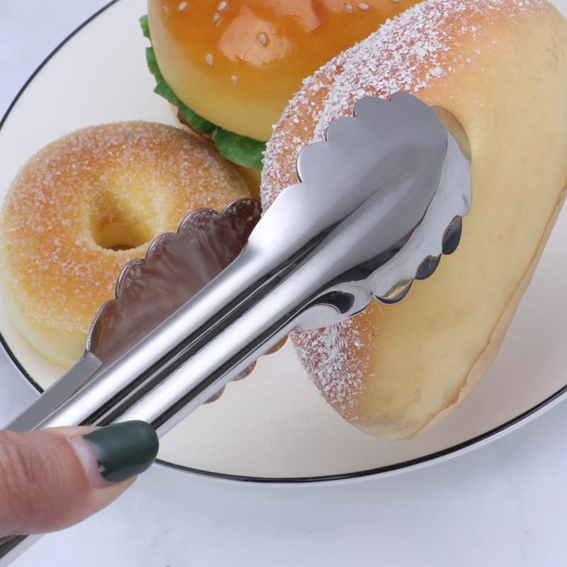 不锈钢食物夹白底实物图