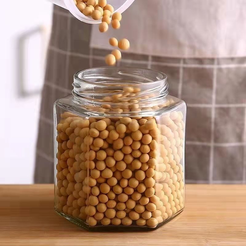 علب زجاجية مختومة مع مربى الليمون العسل، مغلفة بالمربى الحار detail image 5