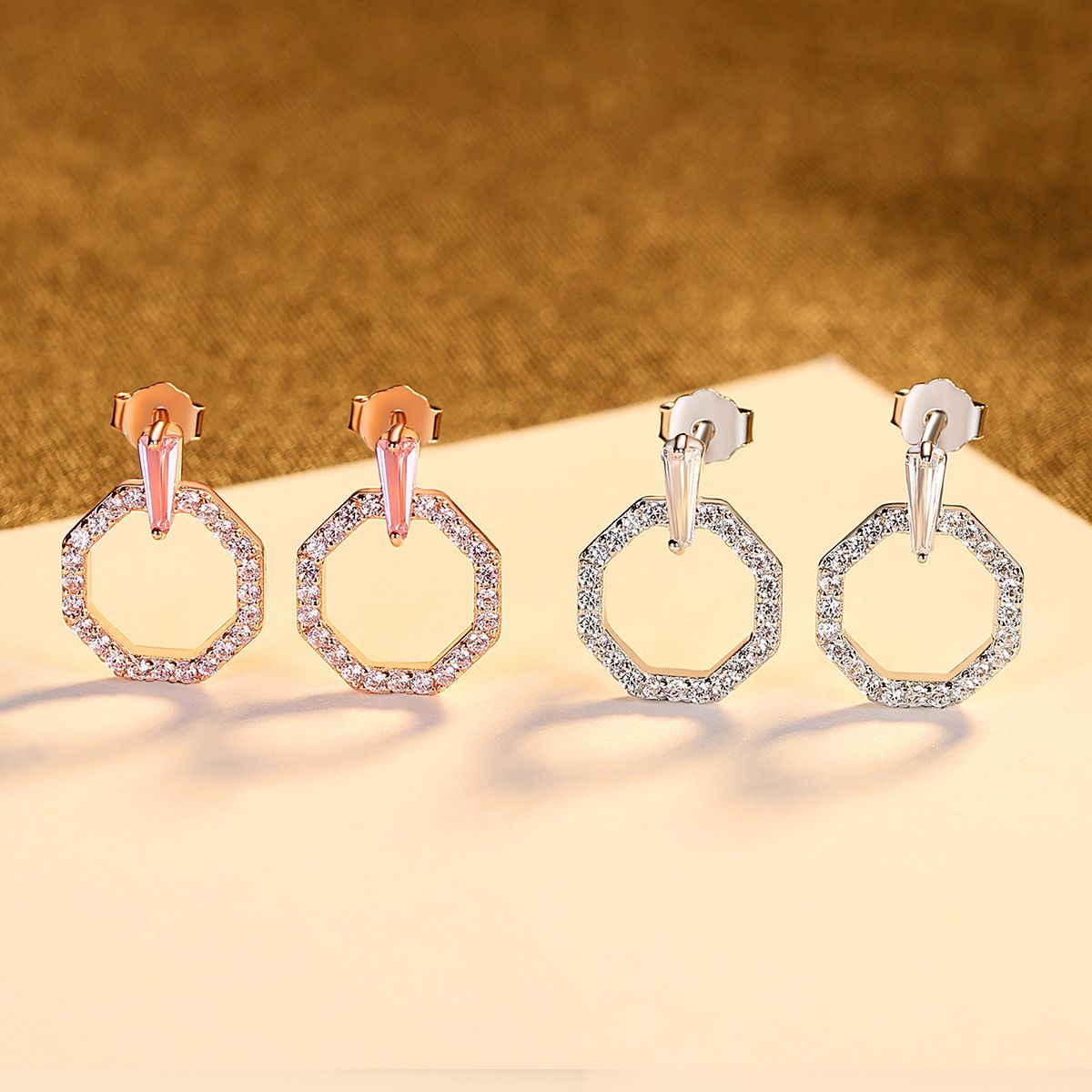 The Korean version of the "Little Chanel S925" earrings, with silver ear rings and pink zirconium stud earrings, is an elegant and fashionable wedding dress accessory Item Picture