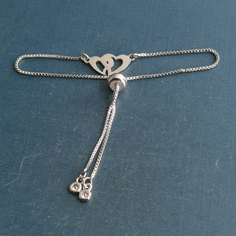 Cross-border best-selling gold and silver dual-color DIY titanium steel jewelry accessories, heart-shaped heart hollowed-out bracelet pendant, stainless steel detail image 3