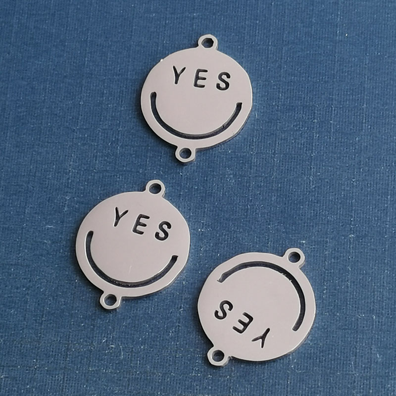 This is a popular and trendy titanium steel smiley yes bracelet pendant with a hip-hop punk expression for couples