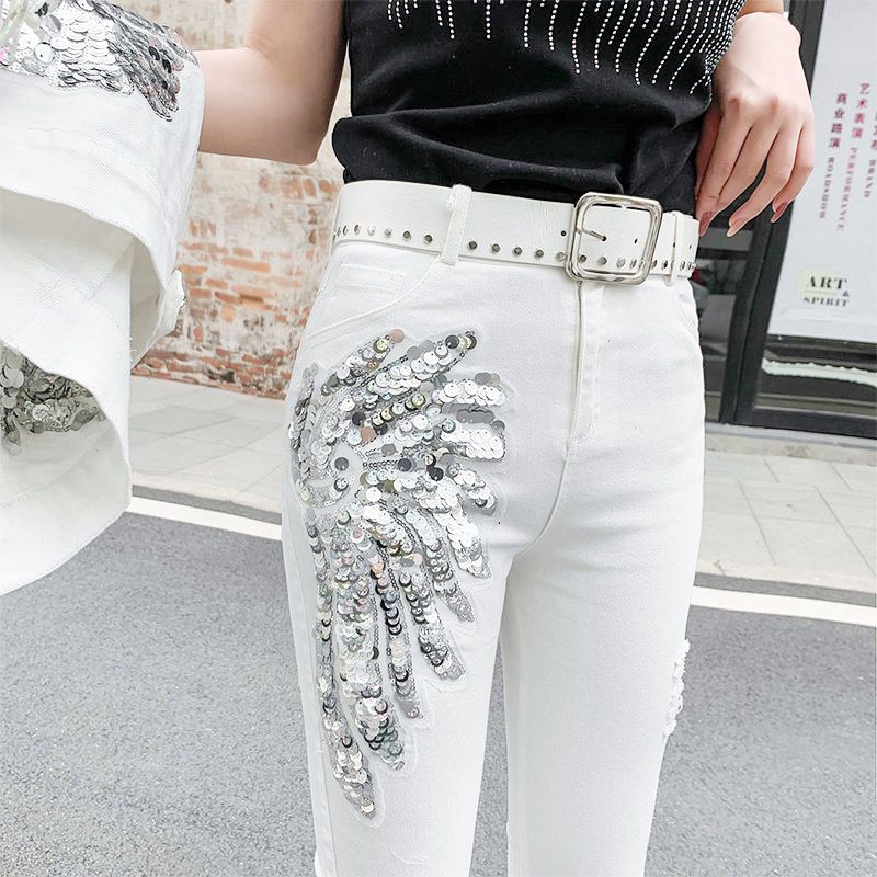 The 2023 new Korean style denim long pants for women are slimming and slimming with sequined phoenix flowers. They are trendy with small feet and fringed pencil pants Specification image