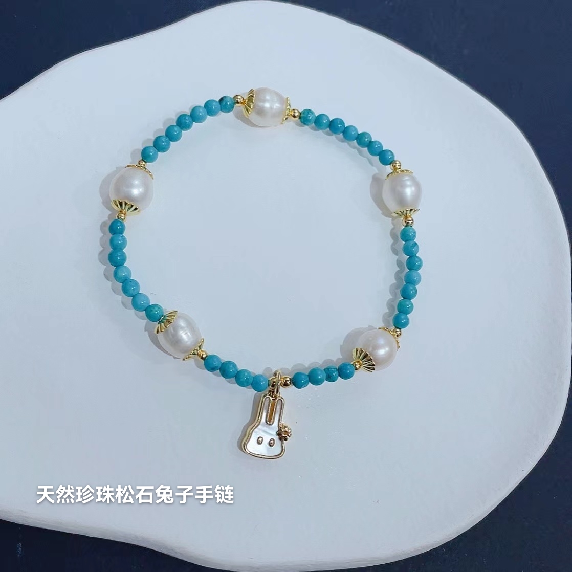 A new bracelet designed with original turquoise and natural pearls for the Year of the Rabbit, the zodiac year