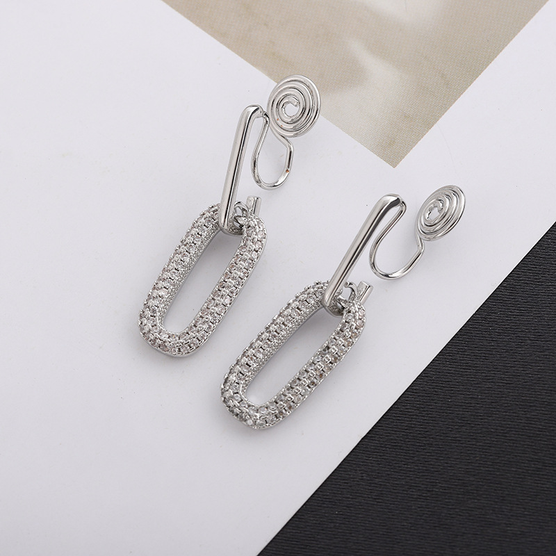 Oval-shaped mosquito-repellent incense coil ear clips for women, no ear holes, exaggerated and high-end personality, niche retro zircon earrings, metal detail image 2