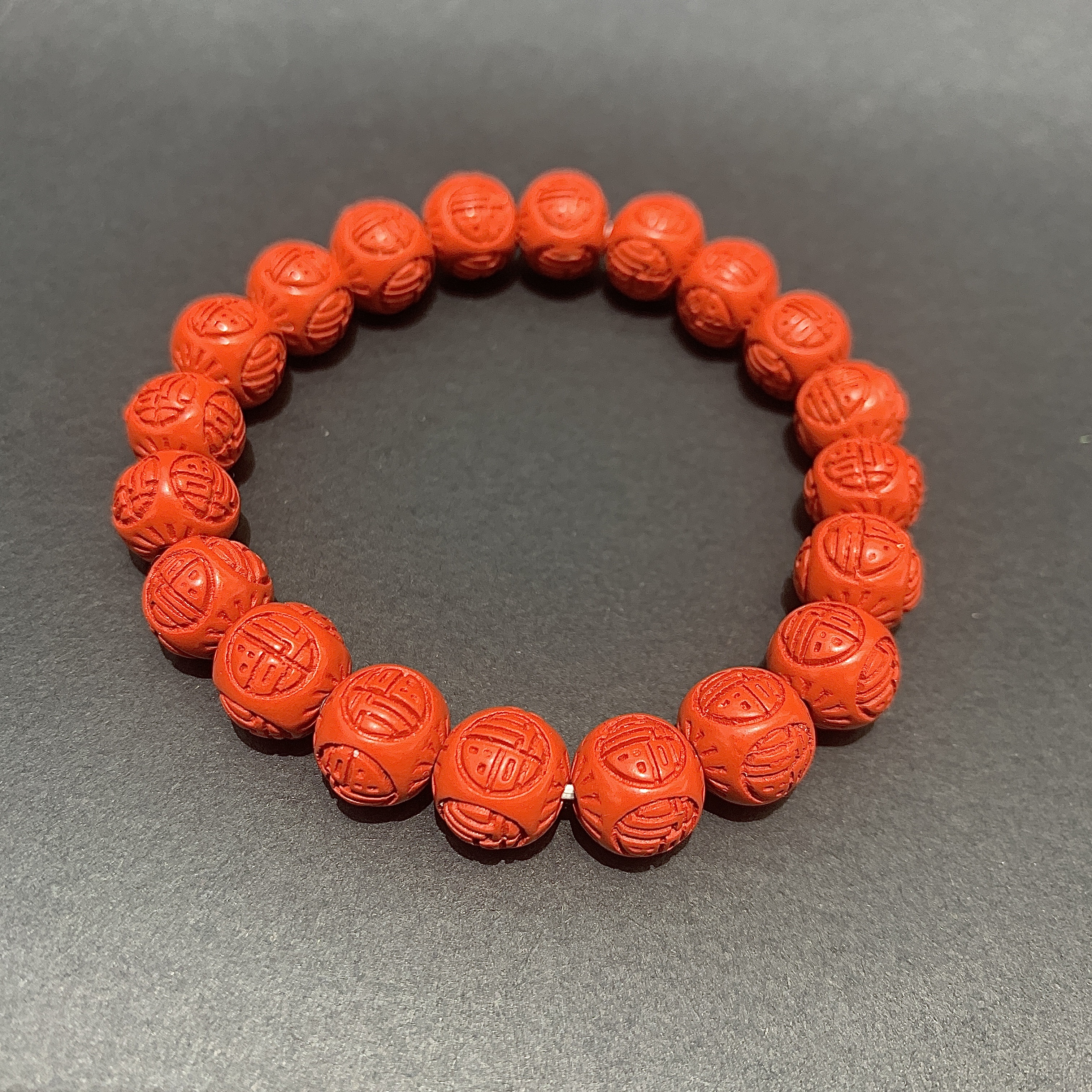 【 Oriental Jade 】 Natural cinnabar red sand six-character mantra for warding off evil and ensuring safety, meandering pattern "Fu" character walnut bracelet carving Item Picture