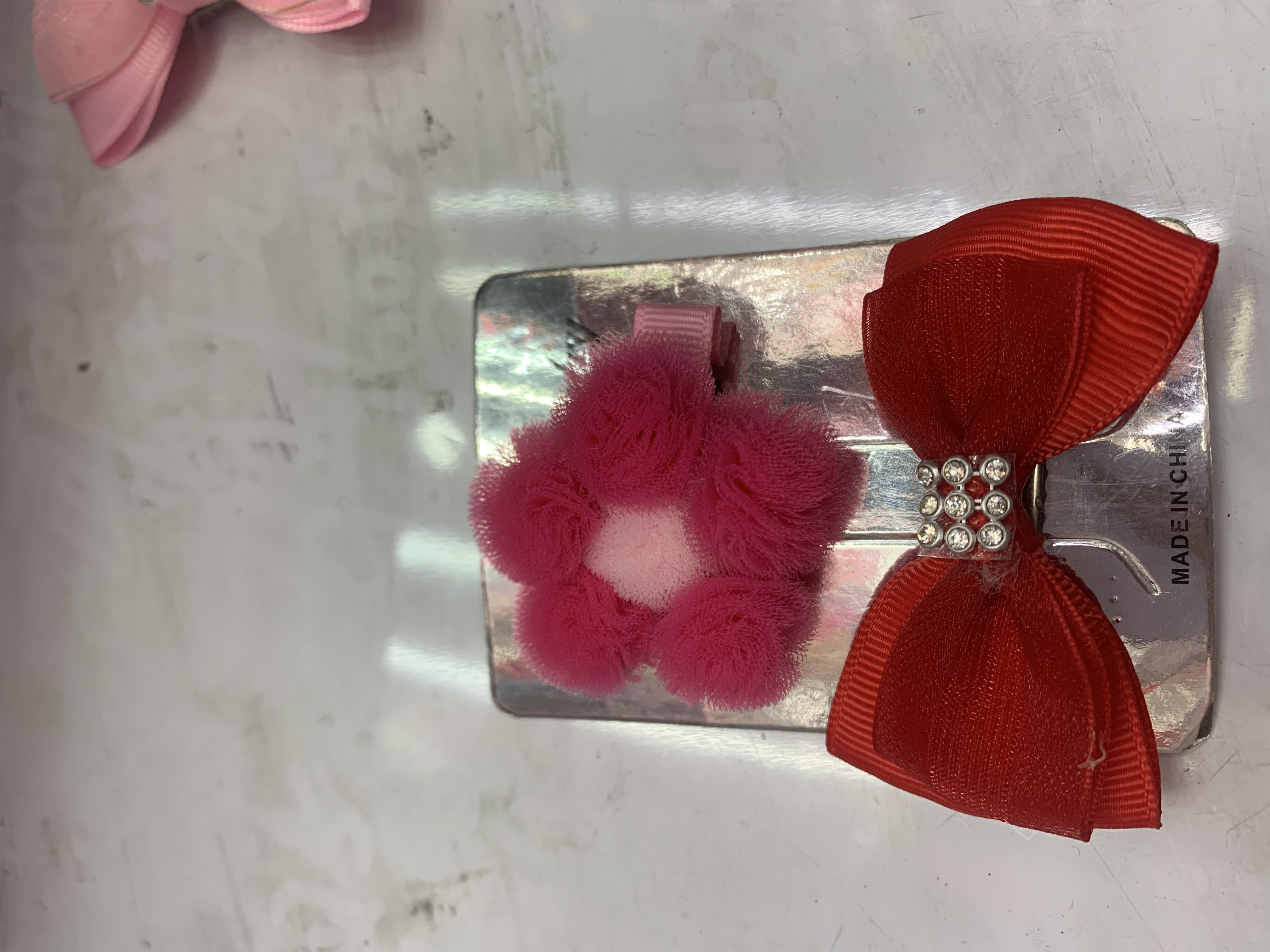 网球+蝴蝶结/鸭夹/饰品白底实物图