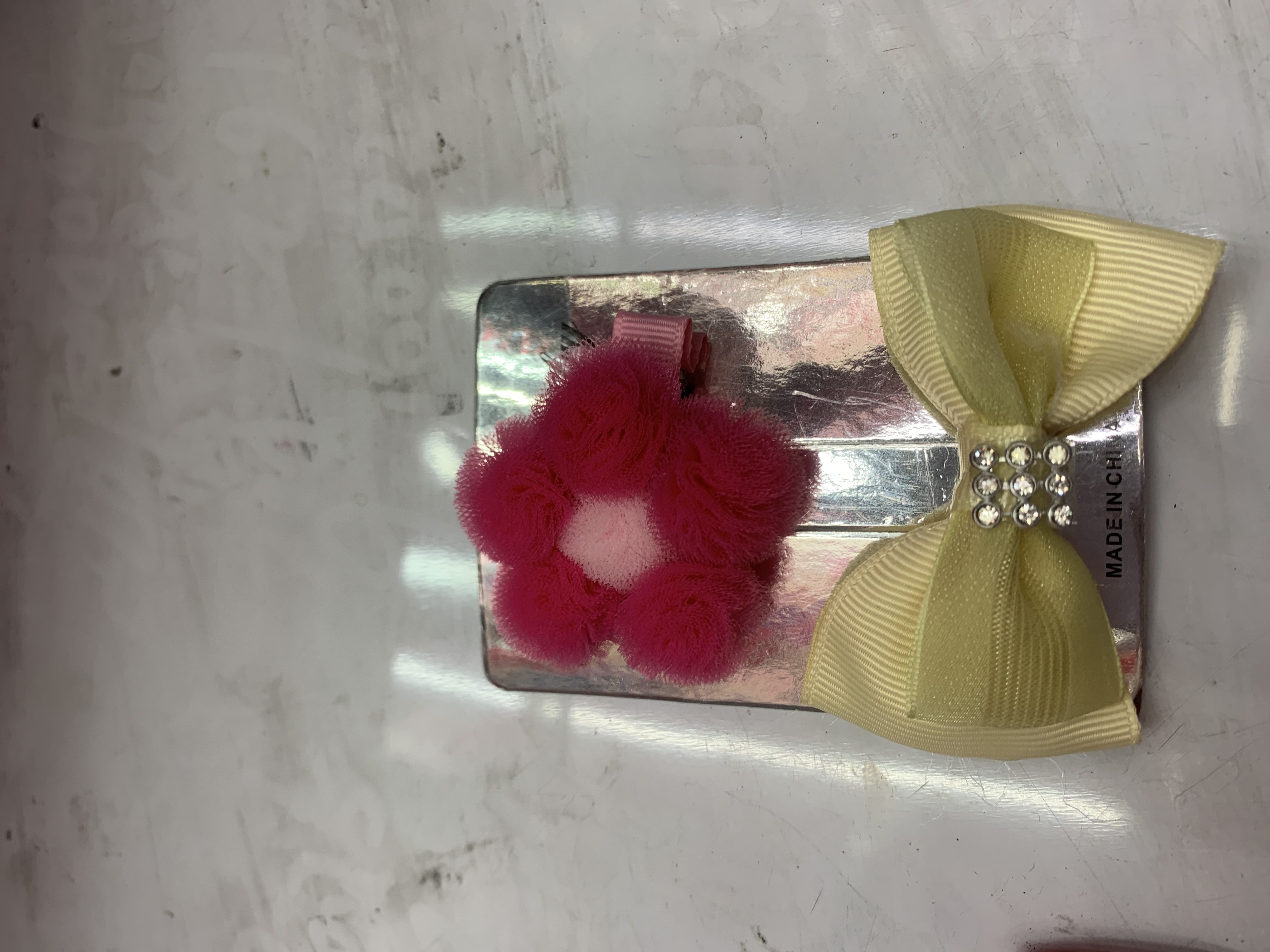 网球+蝴蝶结/鸭夹/饰品白底实物图