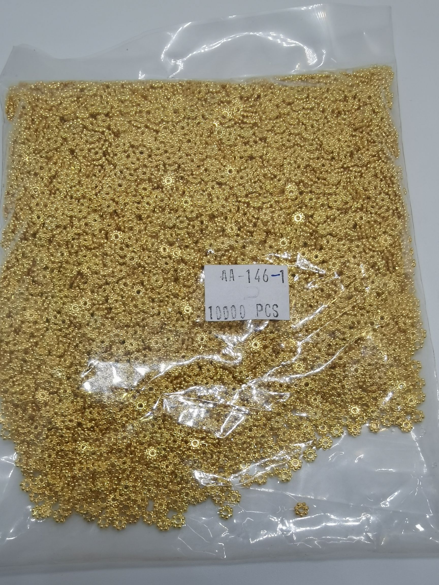 10,000 pieces per pack of 4m ancient gold colored snowflakes