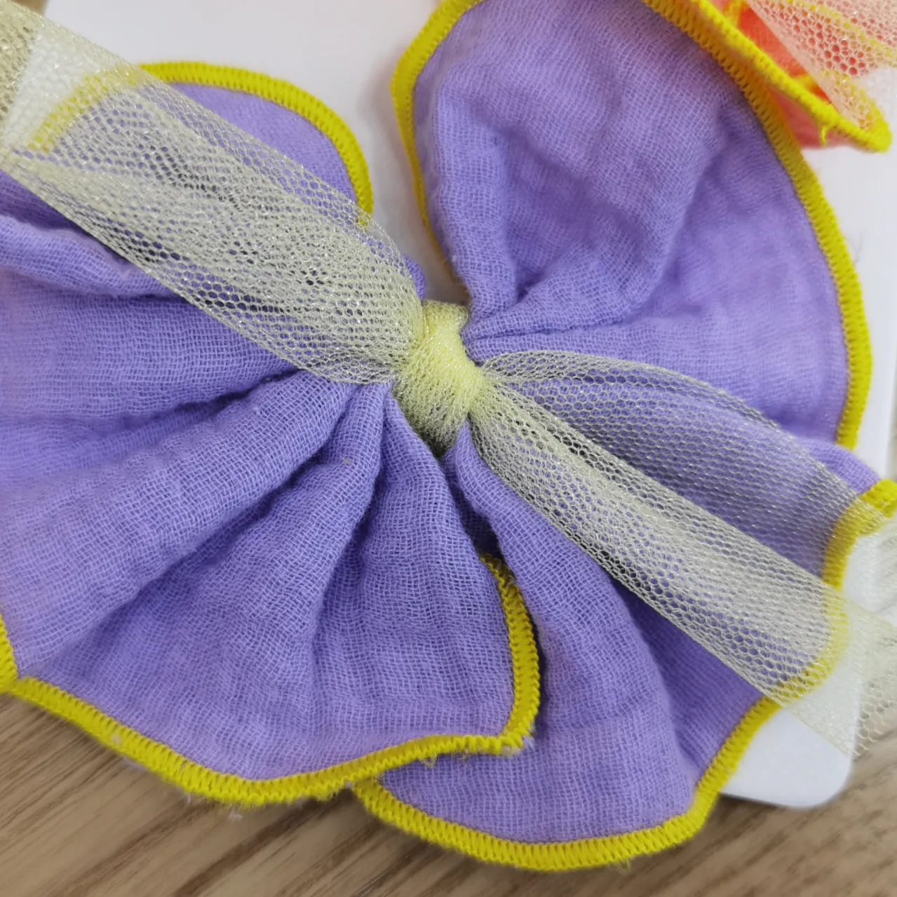 The Korean version of the cute burlap color round bow tie in purple Specification image