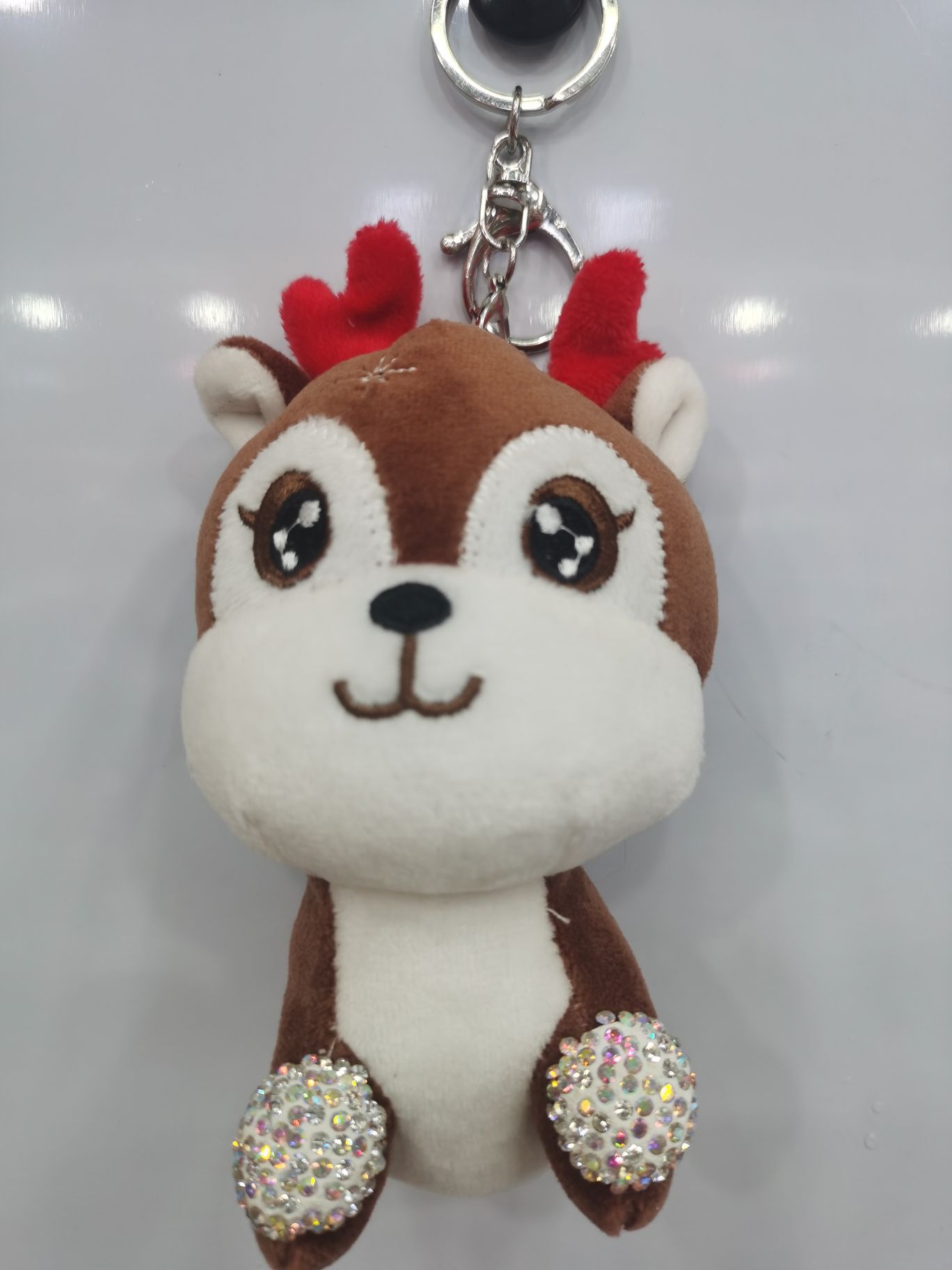 Factory direct sales: 3711 Qilisha Accessories, including various plush balls, pendants, hairballs, and hair hoop headbands. New trendy and cute pet 15Cm sika deer keychains with diamonds in two colors