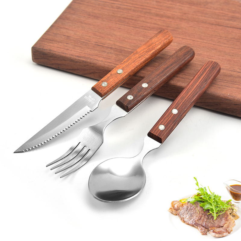 A set of knife, fork and spoon, Western-style wooden handle steak knife, fork and stainless steel three-piece set details Picture