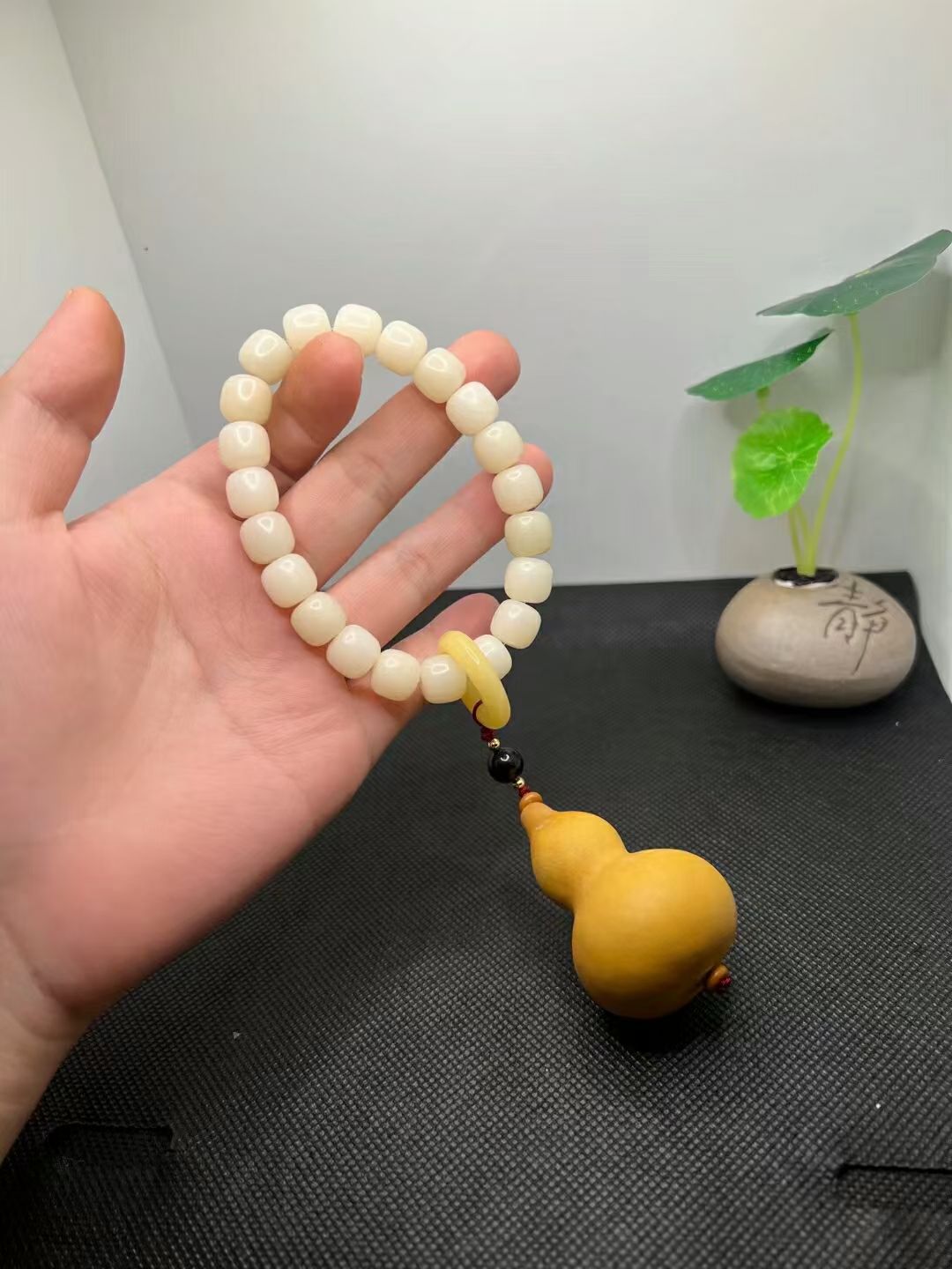 White jade Bodhi bead bracelet with natural hand-twisted gourd detail image 2