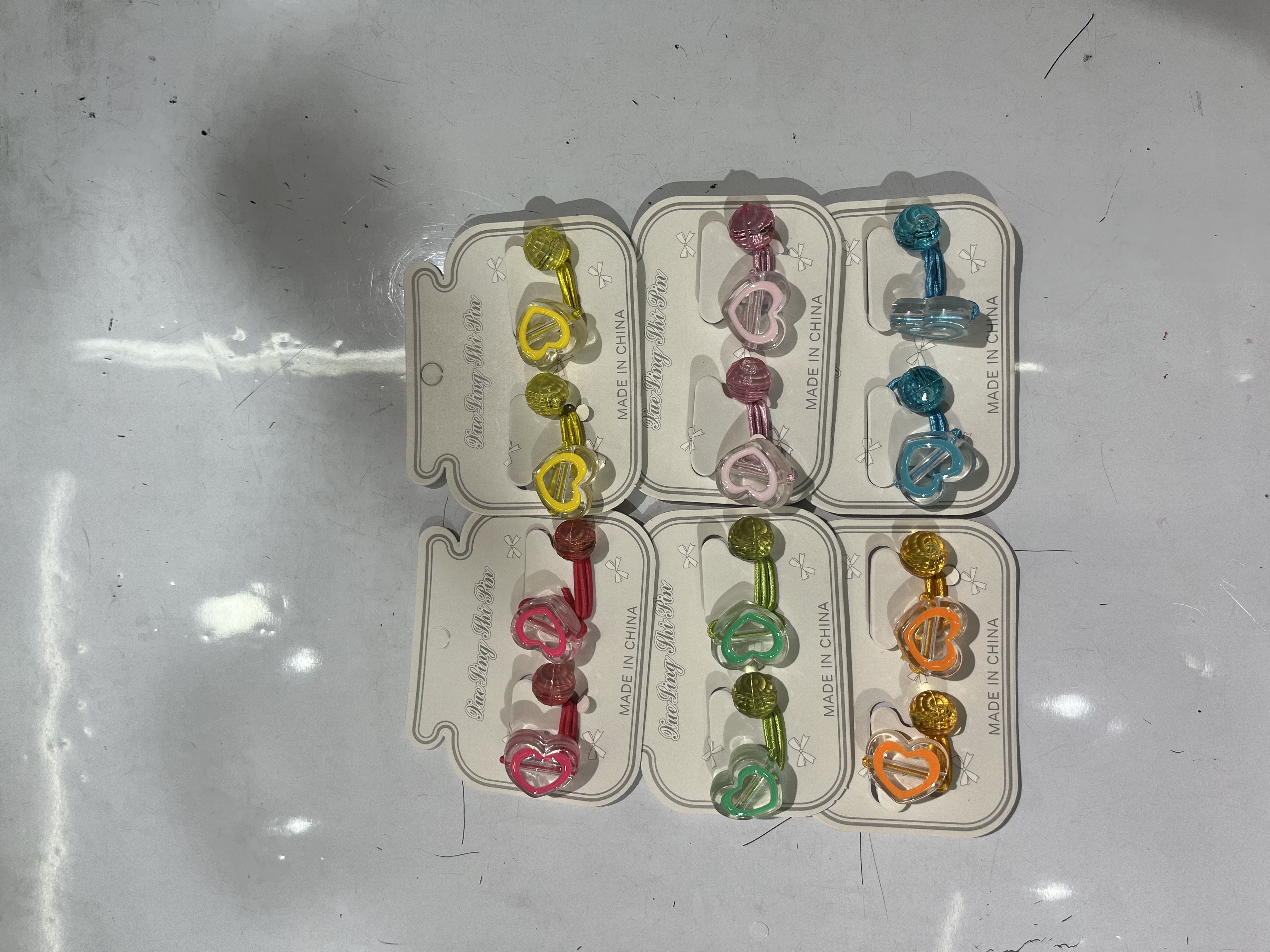 时尚潮流韩版爆款热销特卖桃心滴油皮筋绕卡A区二楼九街小时代、雪琳饰品头饰批发定做厂家直销如图混彩12对皮筋