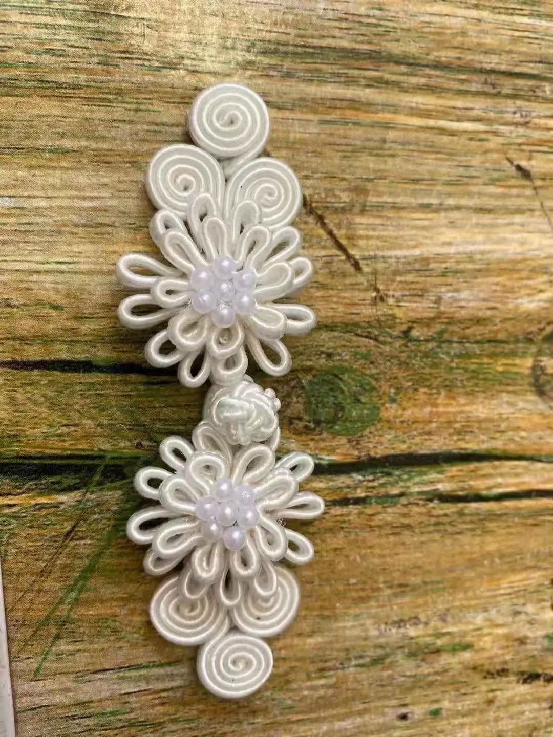 With beaded clasp details Picture