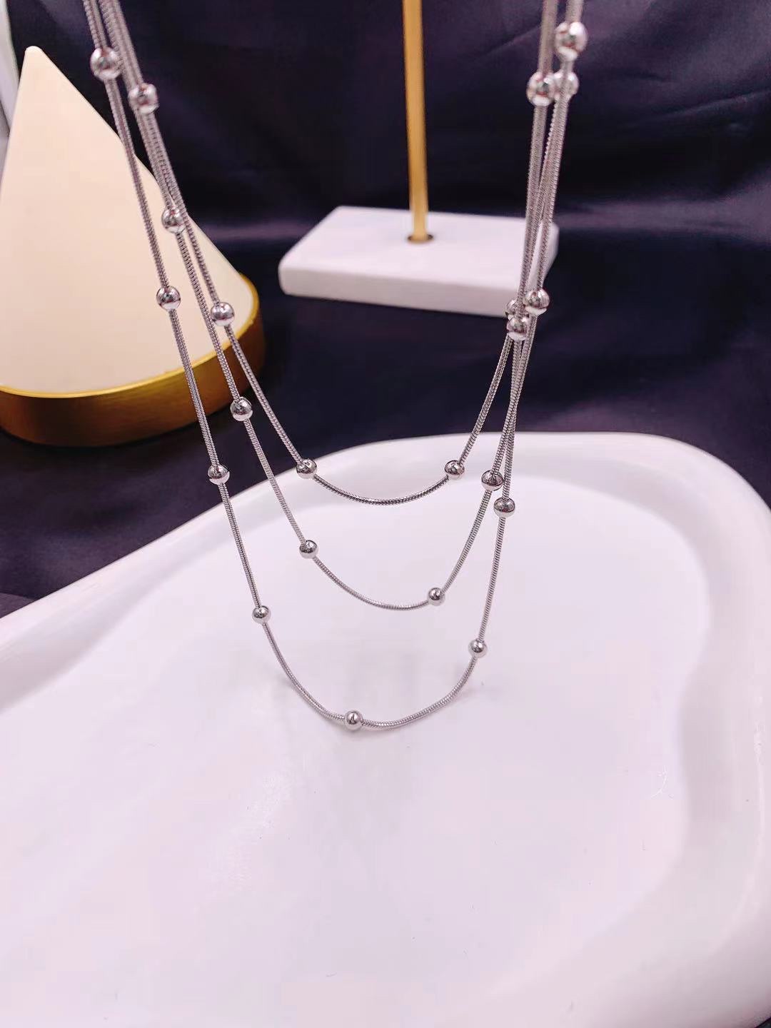 Titanium steel multi-layer necklace is a versatile, fashionable and trendy evening dress details Picture